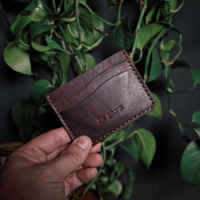 Personalized chestnut leather wallet for travel and business
