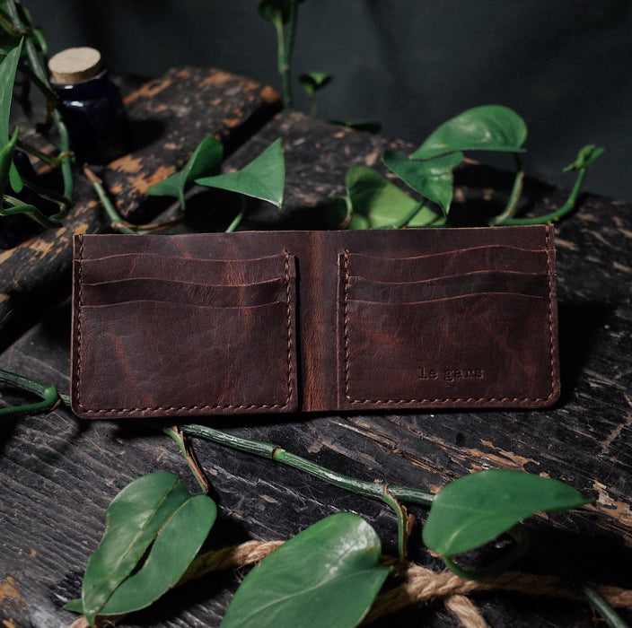 Sleek coffee brown leather bifold wallet made from full-grain leather
