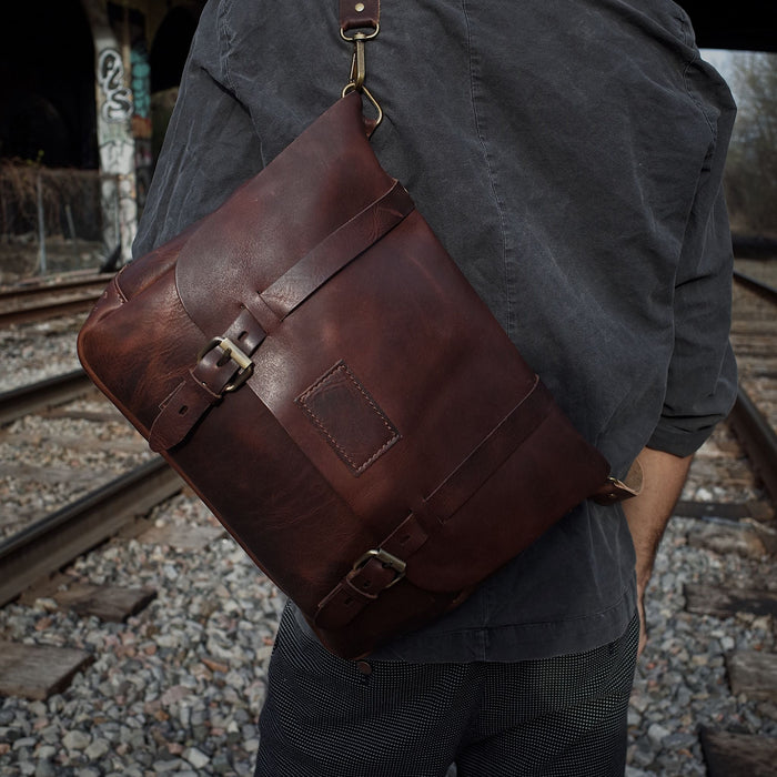 Compact coffee leather briefcase perfect for daily commuting
