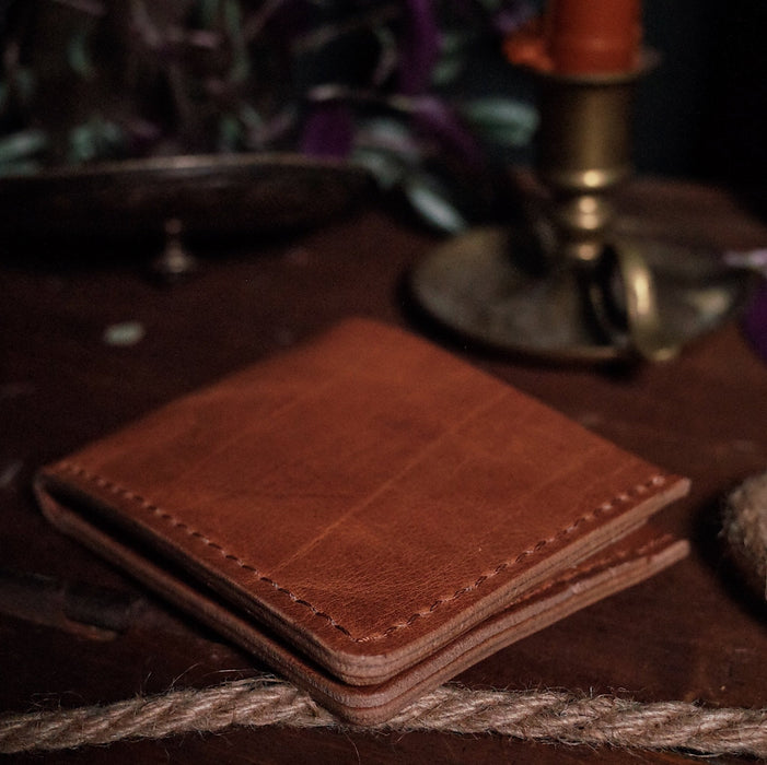 Full-grain saddle tan leather wallet with premium stitching
