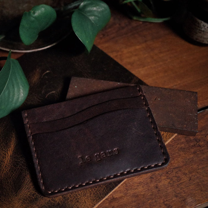 Premium espresso leather wallet with card and cash slots
