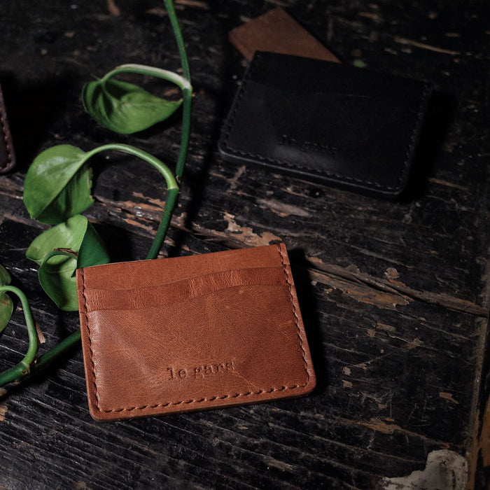 Premium cognac leather wallet with card and cash slots
