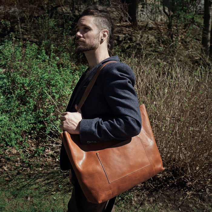 Classic saddle tan leather tote for carrying your daily essentials
