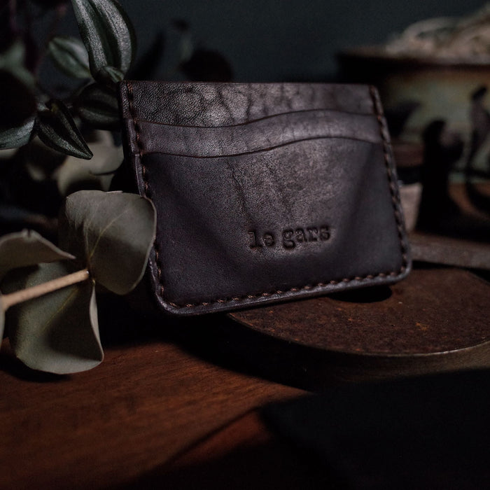 Rustic espresso brown leather wallet with minimalist appeal
