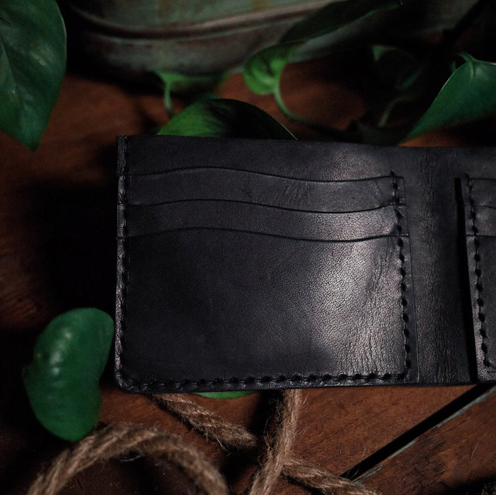 Customizable black leather bifold wallet for business use
