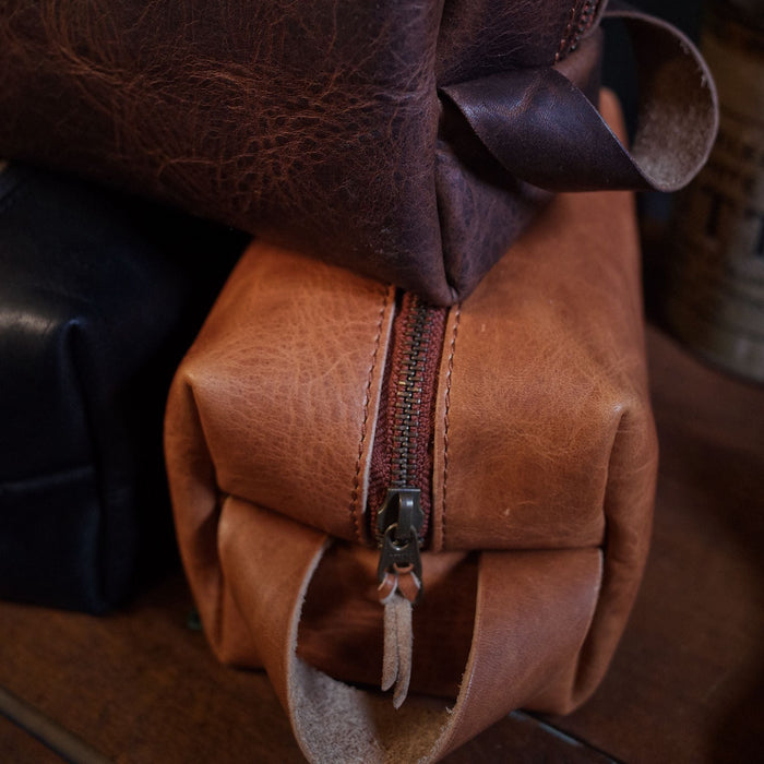 Stylish coffee brown leather toiletry bag for everyday carry
