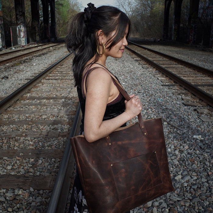 Versatile mahogany leather tote for men and women
