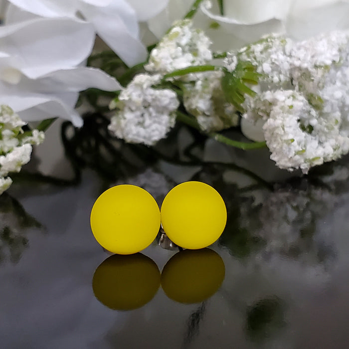 Puces d'oreille jaune verre neuf